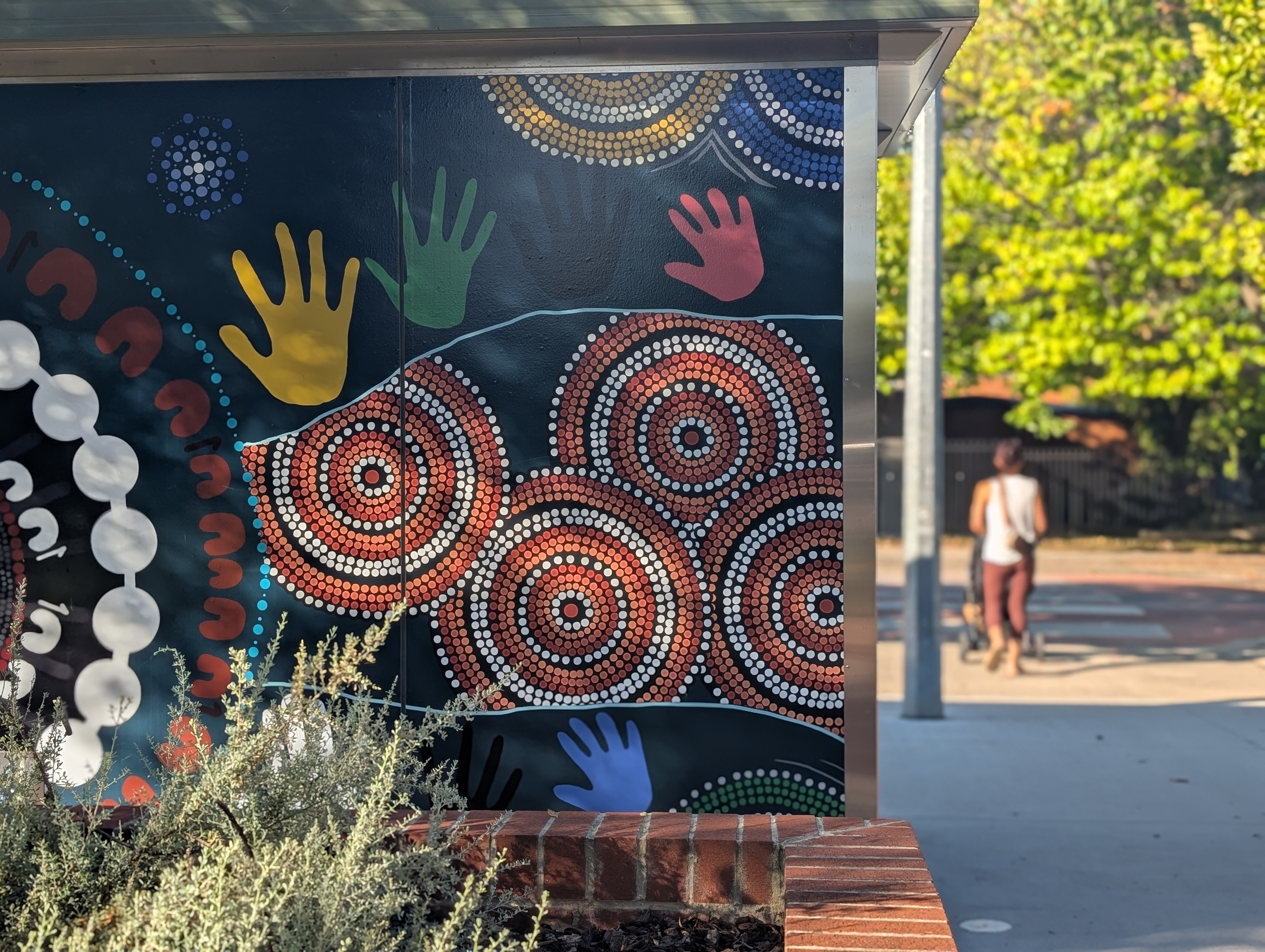 Cultural artwork detail on a public surface